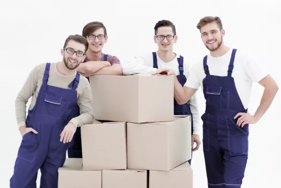 movers with boxes smiling